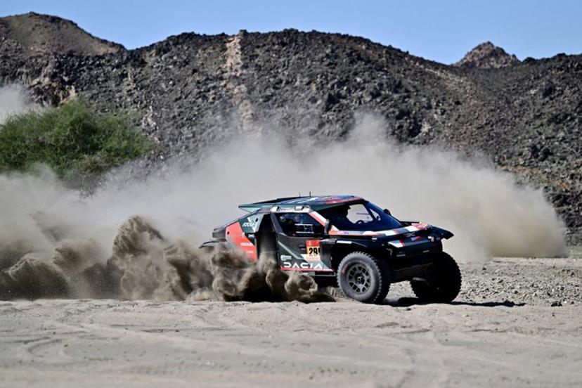 Dacia Sandriders Qatari driver Nasser al-Attiyah assisted by Belgian co-driver Fabian Lurquin compete in the prologue, which determines the starting line-up for the first stage of the 48th edition of the Dakar Rally 2026, between Yanbu and Yanbu, Saudi Arabia, on January 3, 2026. Giuseppe CACACE / AFP