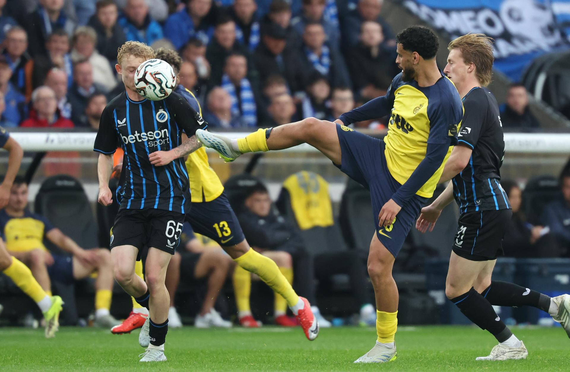 Club's Joaquin Seys and Union's Adem Zorgane fight for the ball during a game between Belgian soccer team Club Brugge KV and Royale Union Saint-Gilloise, Sunday 17 May 2026 in Brugge, on day 8 of the Champion's Play-Off (PO 1) competition of the Jupiler Pro League. BELGA PHOTO VIRGINIE LEFOUR