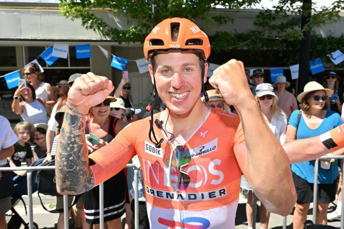 Ineos Grenadiers rider Sam Welsford from Australia celebrates winning stage three of the Tour Down Under UCI Men's Cycling race in Adelaide on January 23, 2026. Brenton Edwards / AFP