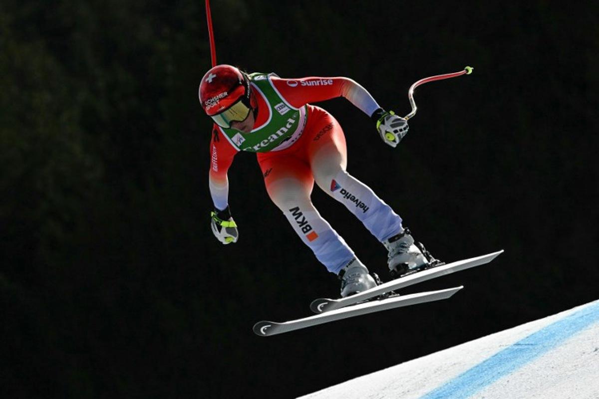 Switzerland's Corinne Suter competes in the women's downhill race, part of the FIS Alpine Ski World Cup 2025-2026 in Soldeu, Andorra on February 26, 2026. Lionel BONAVENTURE / AFP