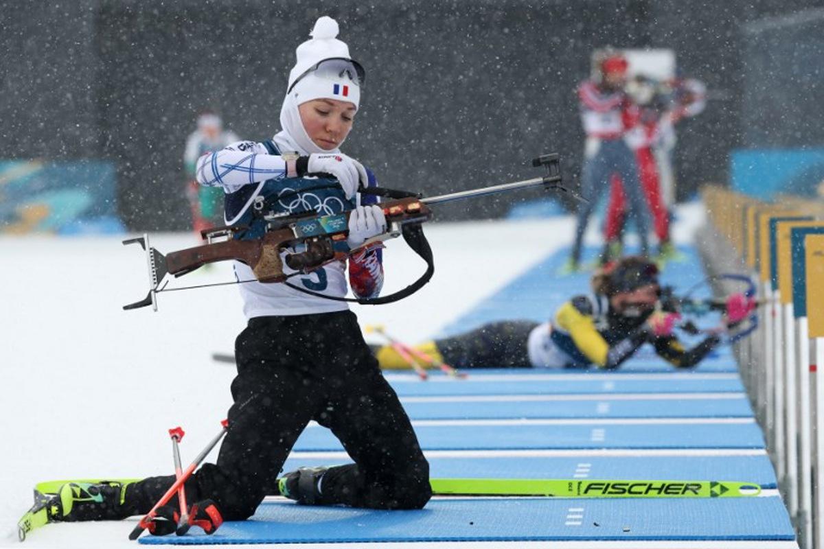 France's Oceane Michelon warms up ahead of the women's biathlon 12.5km mass start event during the Milano Cortina 2026 Winter Olympic Games at the Anterselva Biathlon Arena (Sudtirol Arena) in Anterselva (Val Pusteria) on February 21, 2026. Odd ANDERSEN / AFP