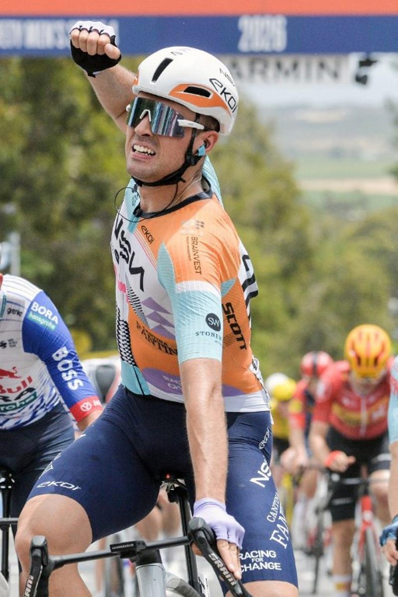 NSN Cycling Team's British rider Ethan Vernon crosses the finish line to win stage four of the Tour Down Under UCI men's cycling race in Adelaide on January 24, 2026. Brenton Edwards / AFP