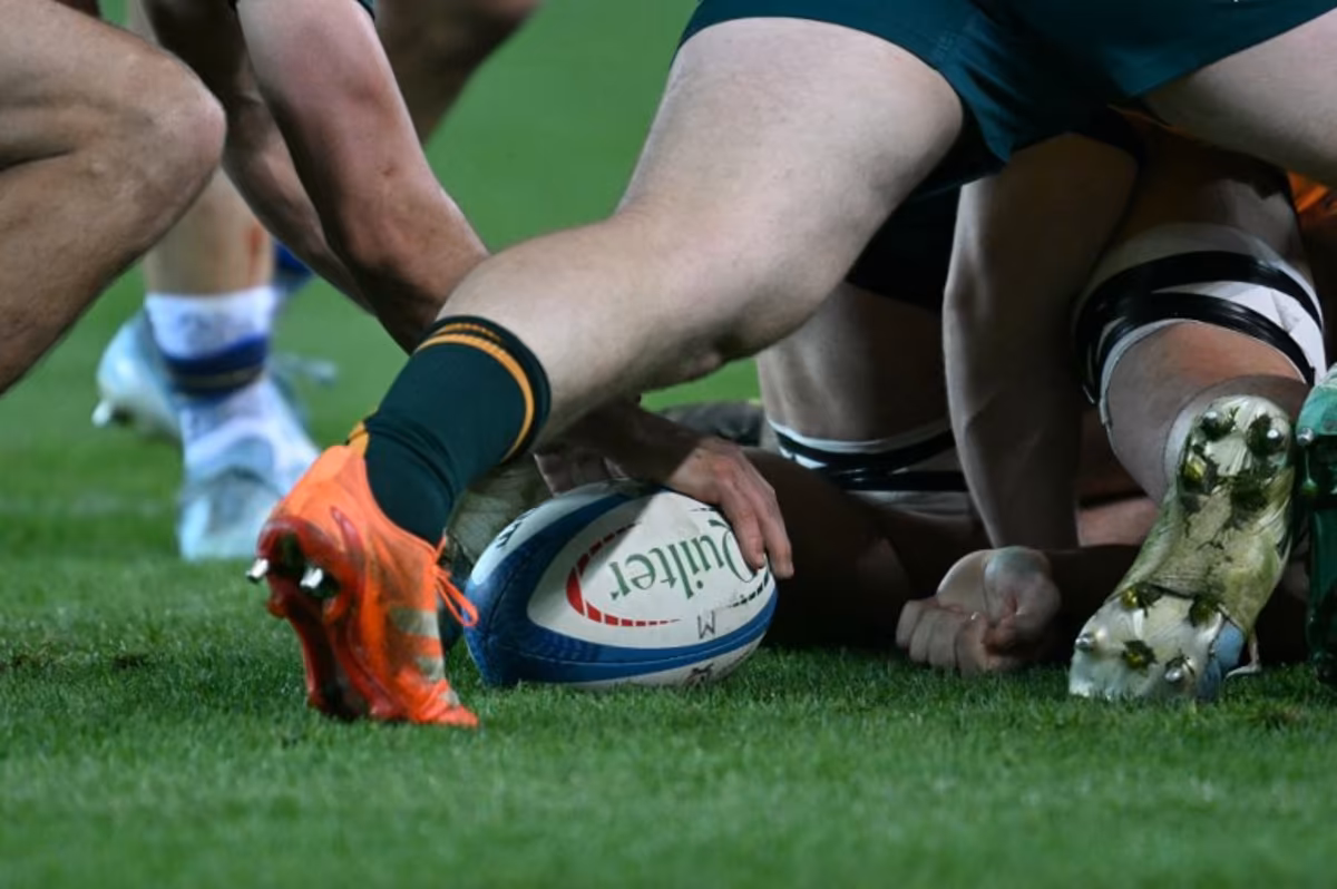 Australian players clear the ball in a scrum during the Autumn Nations Series international rugby union match between Italy and Australia (wallabies) at the Friuli stadium in Udine on November 8, 2025. Stefano RELLANDINI / AFP