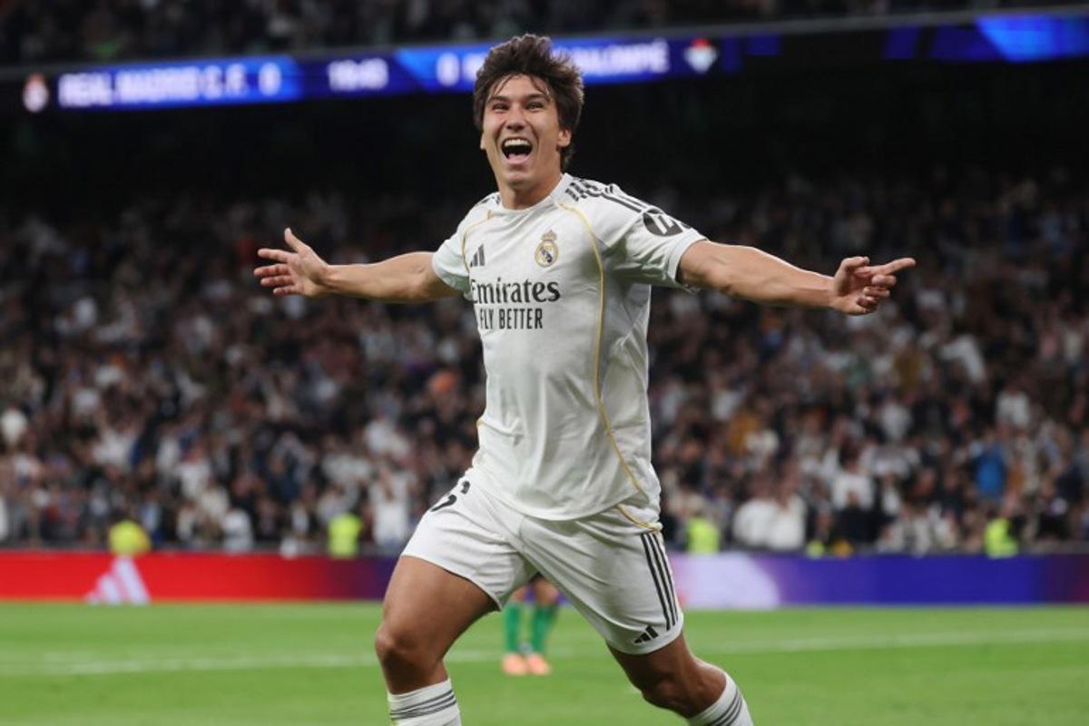 Real Madrid's Spanish forward #16 Gonzalo Garcia celebrates scoring the opening goal during the Spanish League football match between Real Madrid CF and Real Betis at Santiago Bernabeu Stadium in Madrid on January 4, 2026. Pierre-Philippe MARCOU / AFP