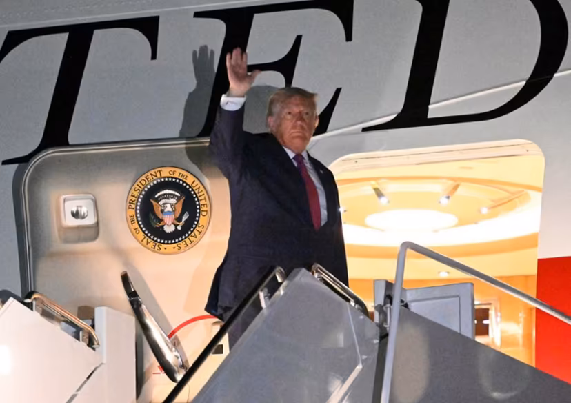US President Donald Trump waves as he boards Air Force One at Ellsworth Air Force Base, South Dakota on July 3, 2026. Trump delivered remarks during the Independence Day events at Mount Rushmore National Memorial in Keystone, South Dakota. Mandel NGAN / AFP