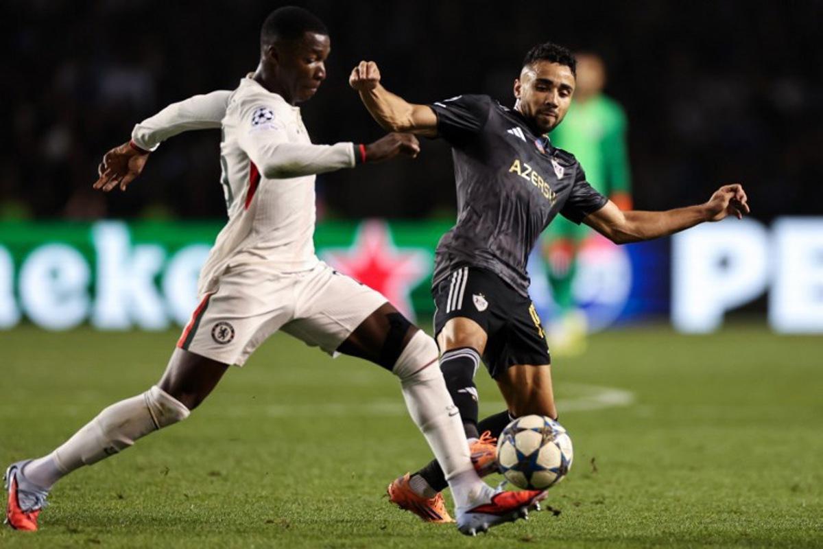 Qarabag's Cape Verdean midfielder #15 Leandro Andrado in action during the UEFA Champions League league phase football match between Qarabag and Chelsea at the Tofiq Bahramov Republican Stadium in Baku on November 5, 2025. Giorgi ARJEVANIDZE / AFP