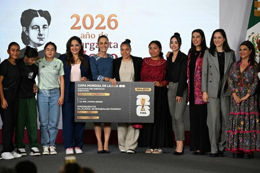 Mexico's President Claudia Sheinbaum (C) poses with the contest winners alongside Mexico City Mayor Clara Brugada (R) and other guests during the awards ceremony of the "Represent Mexico at the World Cup Opening" contest, launched in March, at the National Palace in Mexico City on May 29, 2026. YURI CORTEZ / AFP