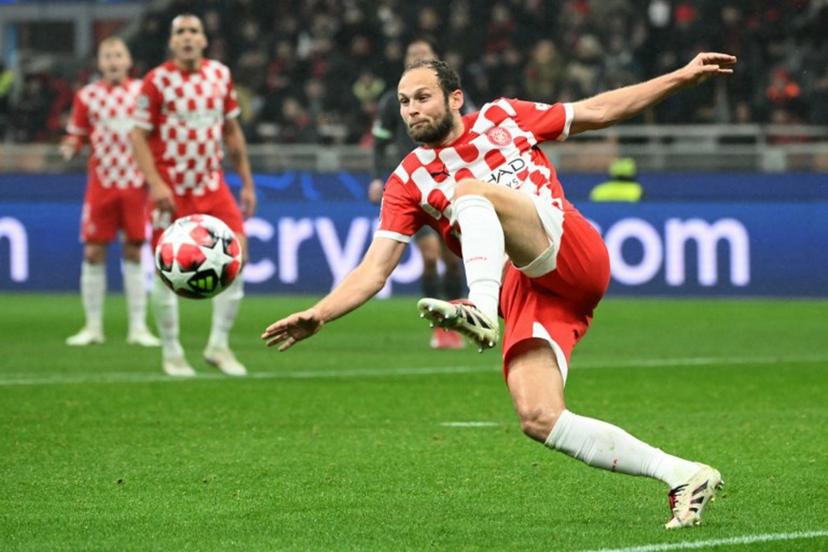 Girona's Dutch defender #17 Daley Blind kicks the ball during the UEFA Champions League football match between AC Milan and Girona at San Siro stadium in Milan, on January 22, 2025. Alberto PIZZOLI / AFP