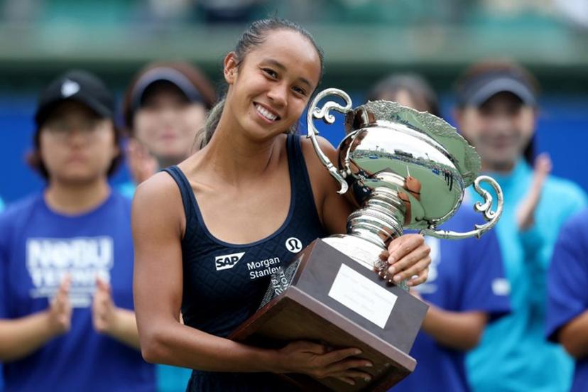 Canada's Leylah Fernandez poses with the winner's trophy after defeating Czech Republic's Tereza Valentova in their women's singles final match at the Japan Open tennis tournament in Osaka on October 19, 2025. PAUL MILLER / AFP