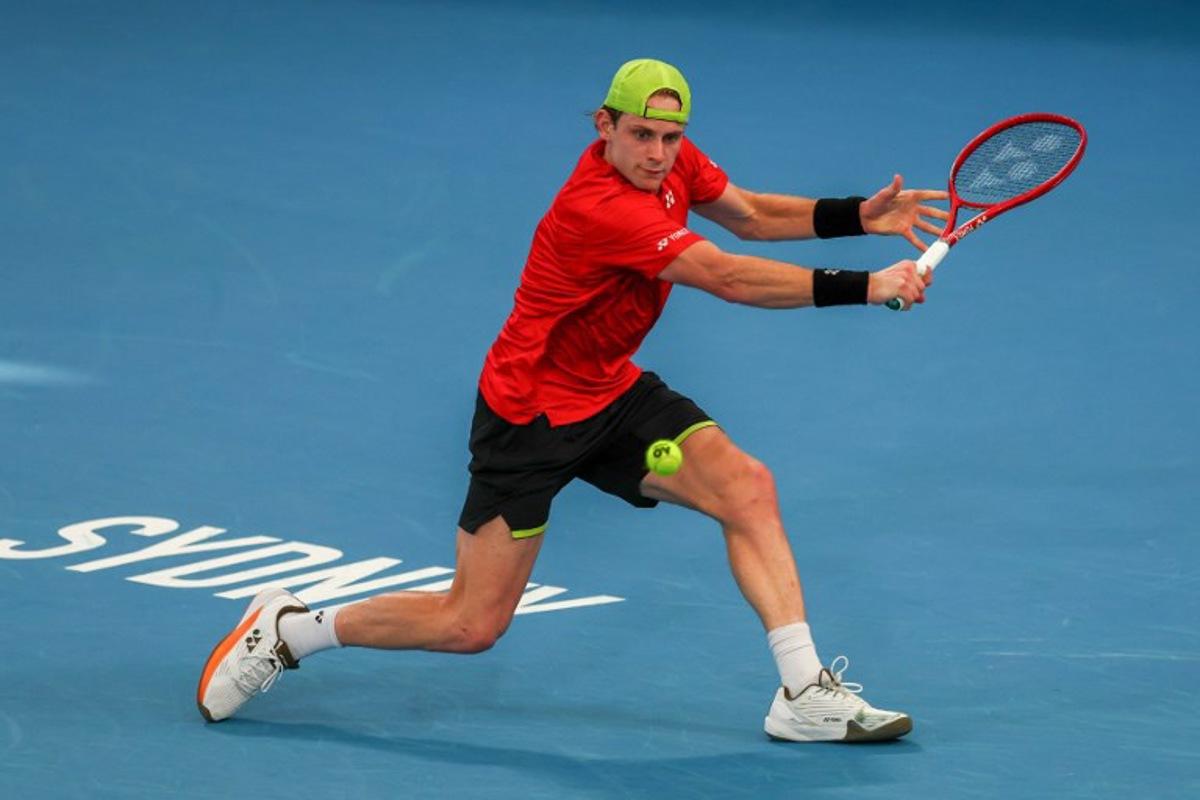 Belgium's Zizou Bergs hits a return to Czech Republic's Jakub Mensik during their men's singles quarter-final match at the United Cup tennis tournament in Sydney on January 8, 2026. Izhar KHAN / AFP