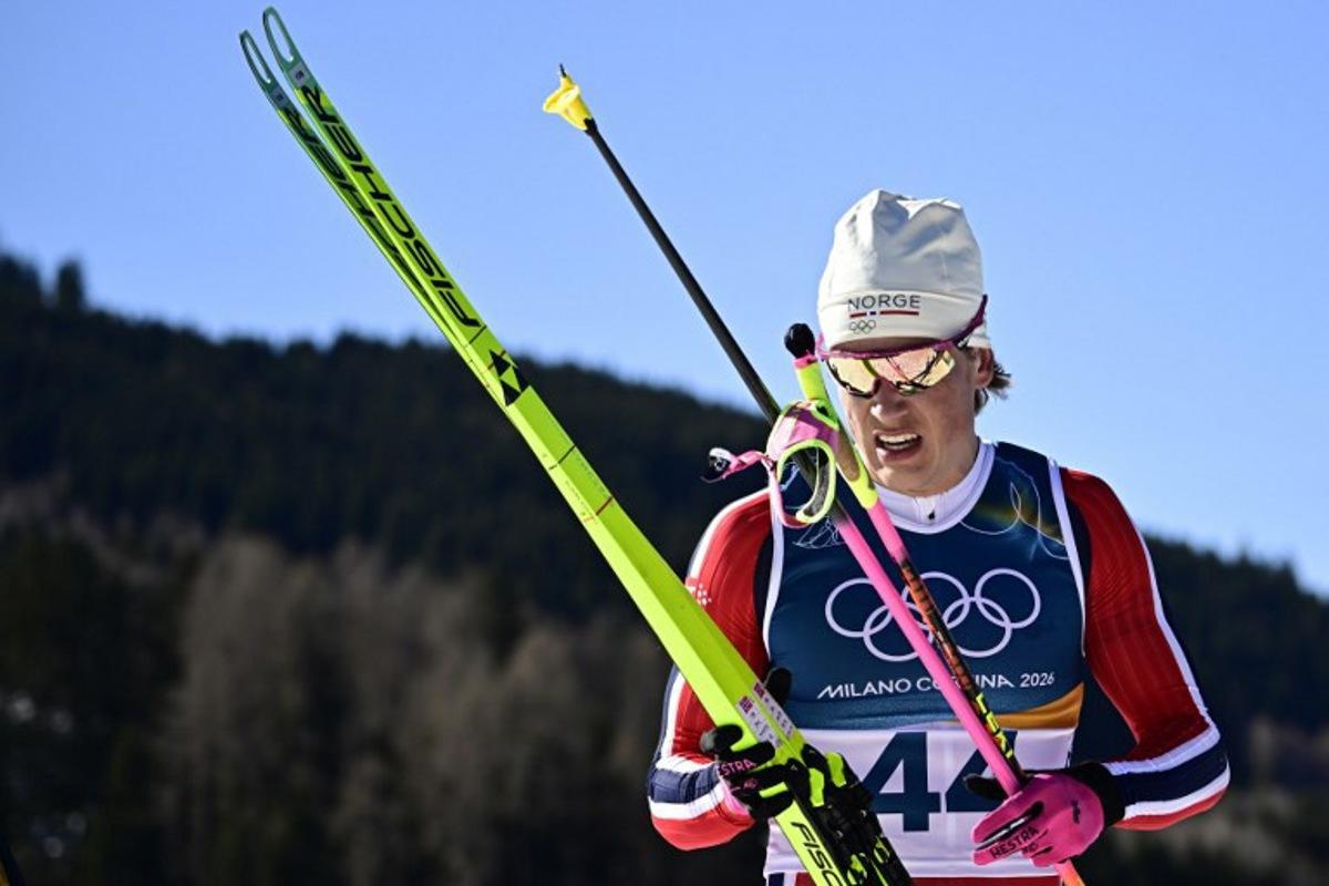 Norway's Johannes Hoesflot Klaebo reacts after crossing the finish line during the men's 10km cross-country interval start free event of the Milano Cortina 2026 Winter Olympic Games at Tesero Cross-Country Skiing Stadium in Lago di Tesero (Val di Fiemme) on February 13, 2026. Tobias SCHWARZ / AFP