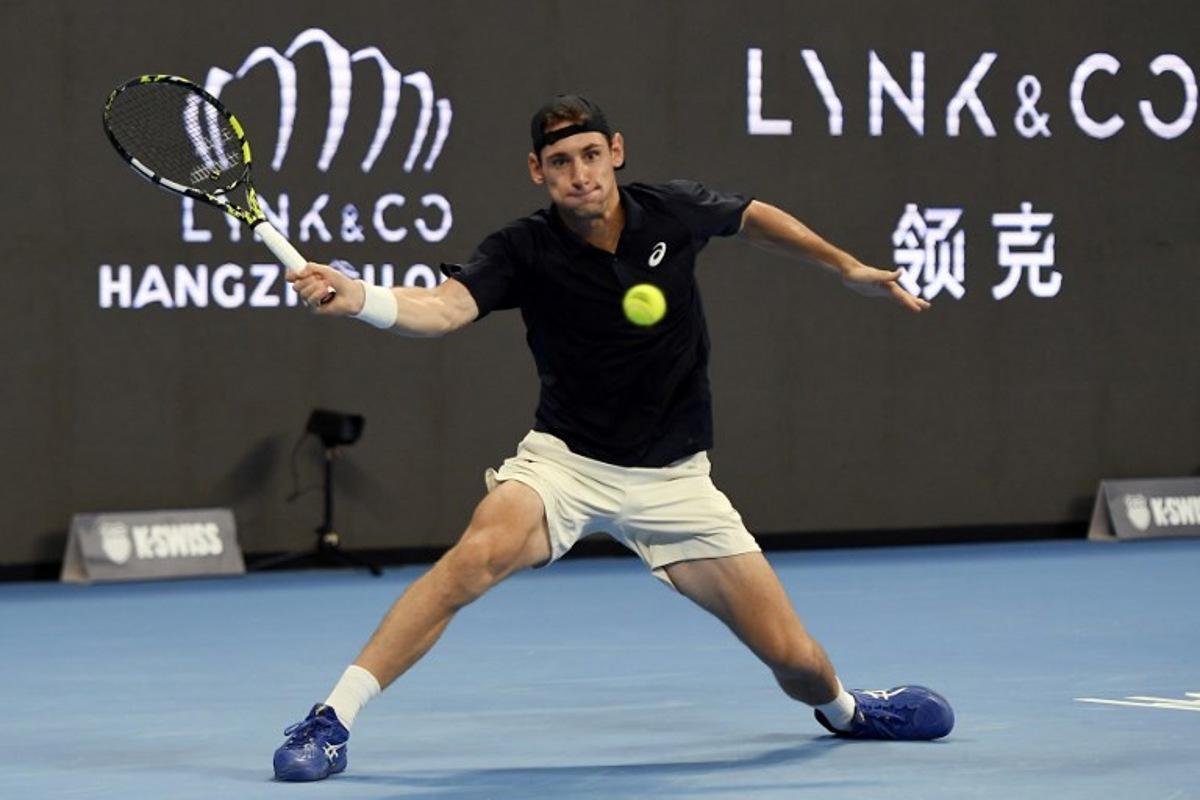 France's Valentin Royer hits a return to France's Corentin Moutet during their men's singles semi-final match at the Hangzhou Open tennis tournament in Hangzhou, in China's eastern Zhejiang province on September 22, 2025. STR / AFP
