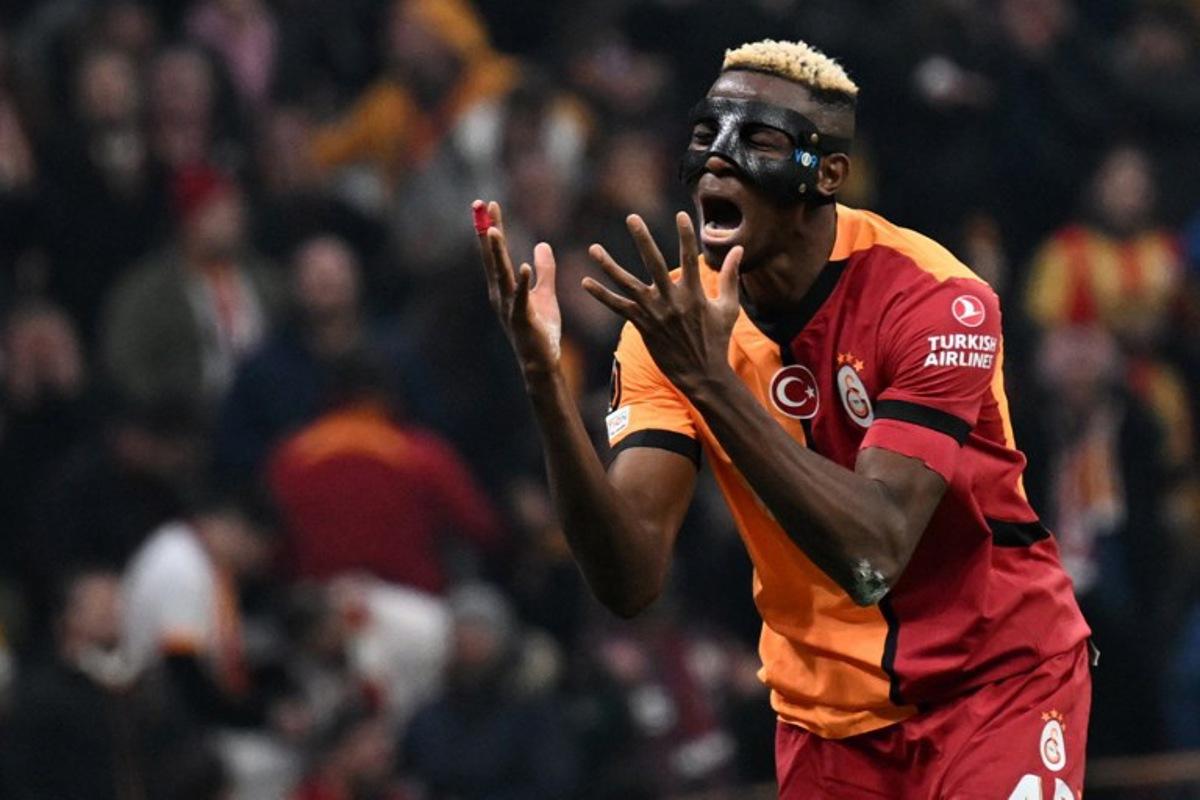Galatasaray's Nigerian forward #45 Victor Osimhen reacts after missing a goal opportunity during the UEFA Europa League, league phase matchday 7 football match between Galatasaray SK and FC Dynamo Kyiv at the Ali Sami Yen Spor Kompleksi in Istanbul on January 21, 2025. Ozan KOSE / AFP