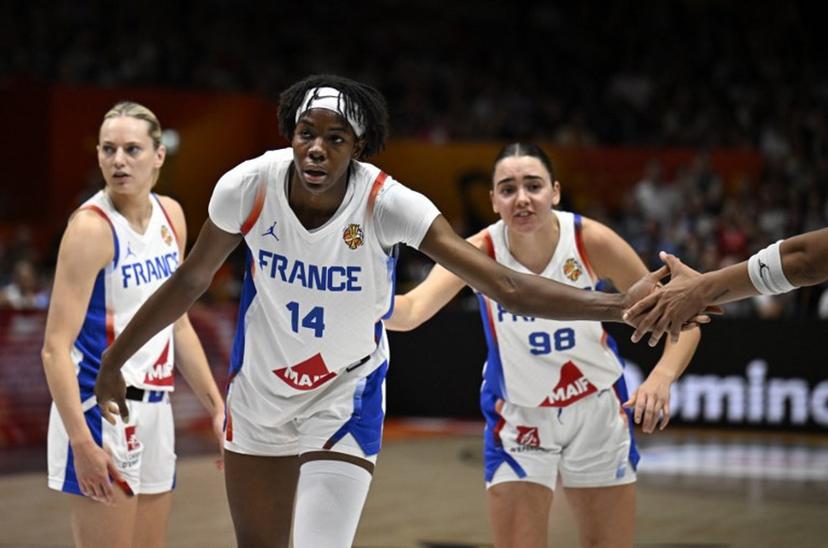 France's center #14 Dominique Malonga celebrates a point during the 2026 FIBA Women's Basketball World Cup semi-final match between France and Germany in Berlin on September 12, 2026. Tobias SCHWARZ / AFP