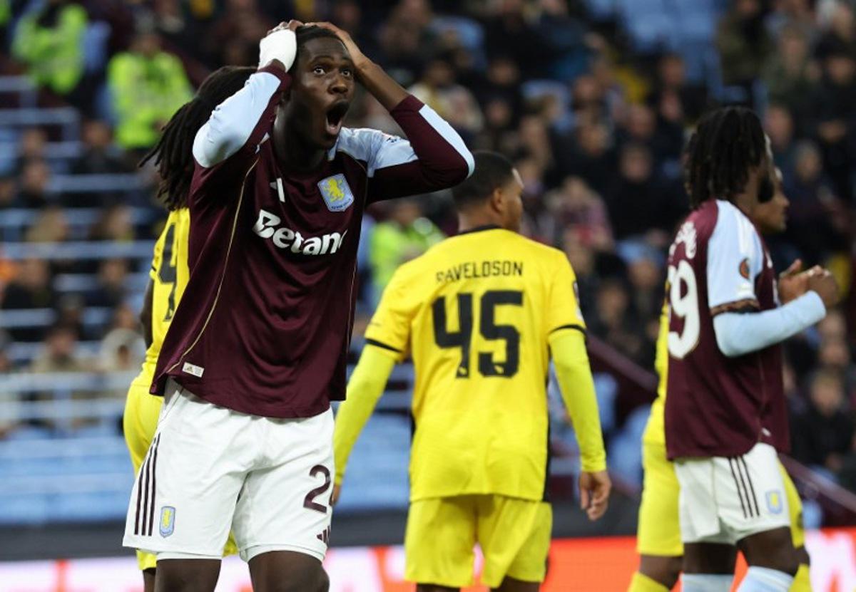Aston Villa's Belgian midfielder #24 Amadou Onana reacts at a missed opportunity during the UEFA Europa League league-stage football match between Aston Villa and Young Boys at Villa Park in Birmingham on November 27, 2025. Darren Staples / AFP