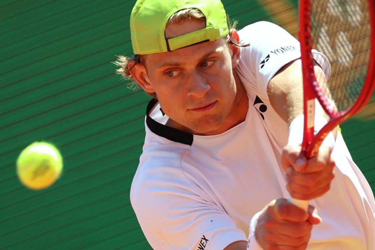 Belgium's Zizou Bergs returns to Germany's Alexander Zverev during their Monte Carlo ATP Masters Series Tournament round of 16 tennis match on Court Rainier III at the Monte-Carlo Country Club in Roquebrune-Cap-Martin, south-eastern France on April 9, 2026. Valery HACHE / AFP