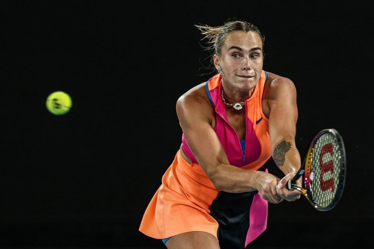 Belarus' Aryna Sabalenka hits a return against Kazakhstan's Elena Rybakina during their women's singles final match on day fourteen of the Australian Open tennis tournament in Melbourne on January 31, 2026. IZHAR KHAN / AFP