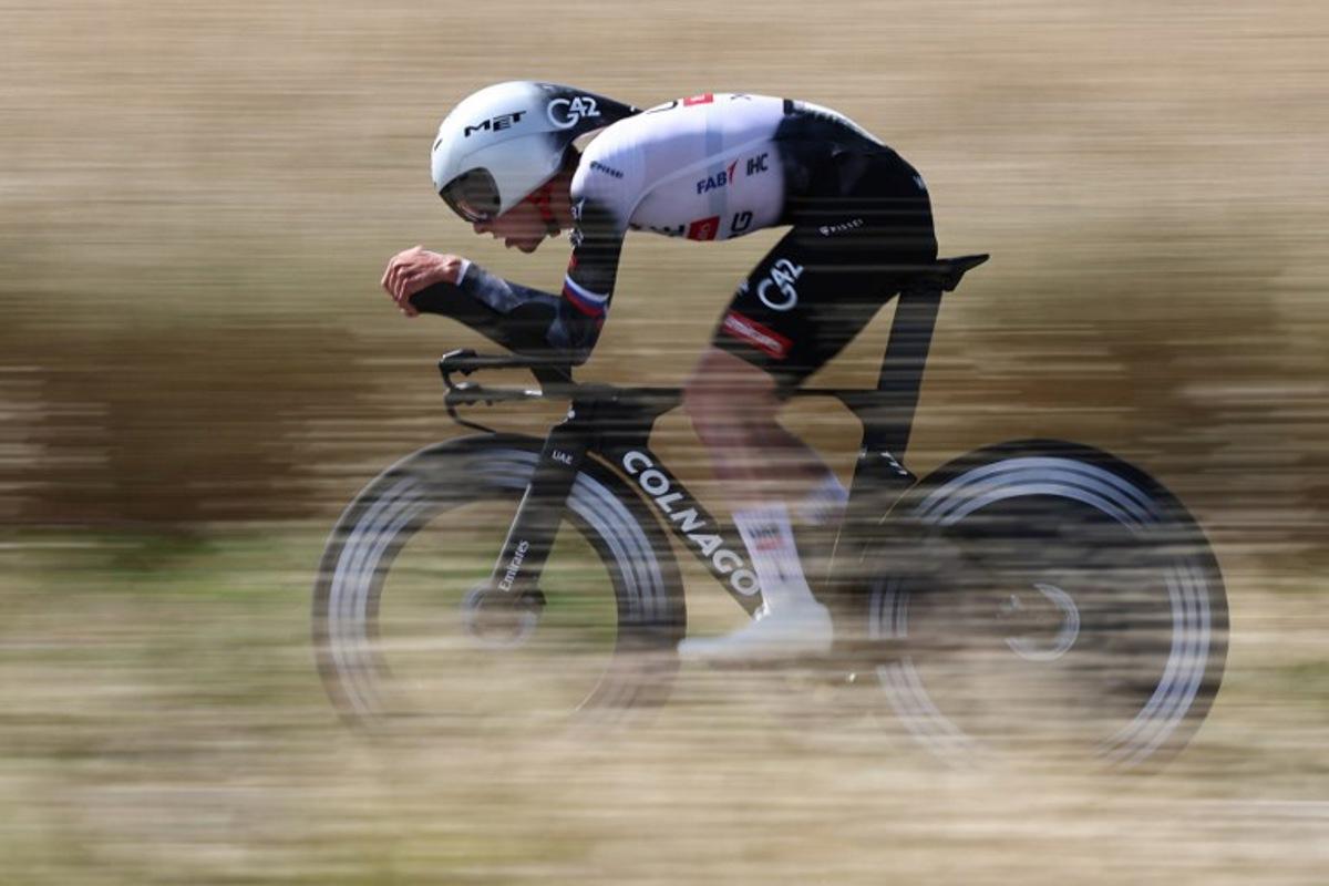 UAE Team Emirates XRG's Slovenian rider Tadej Pogačar cycles during the 4th stage of the 77th edition of the Criterium du Dauphine cycling race, a 17,4 km individual time trial between Charmes-sur-Rhône and Saint-Péray, on June 11, 2025. Anne-Christine POUJOULAT / AFP