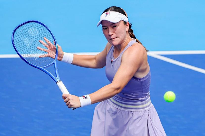 New Zealand´s Lulu Sun hits a return to USA´s Caty McNally during their women's singles quarterfinal match at the Guangzhou Open tennis tournament in Guangzhou, China's southern Guangdong province on October 24, 2025.  STR / AFP