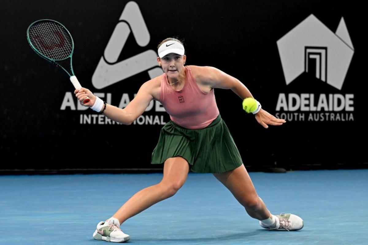 Russia's Mirra Andreeva hits a return to her compatriot Diana Shnaider during their women's singles semi-final match at the Adelaide International tennis tournament in Adelaide on January 16, 2026. Michael ERREY / AFP