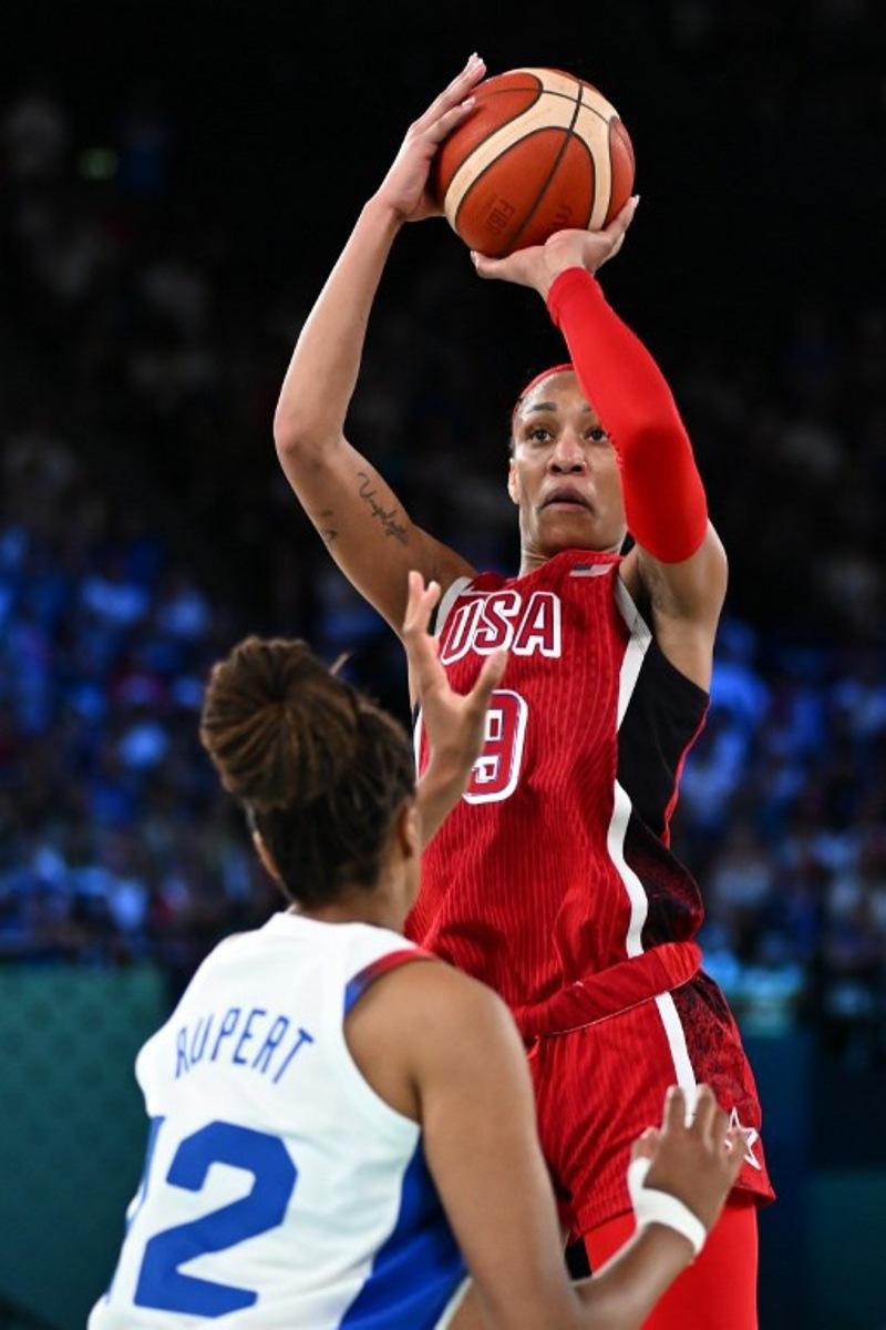 USA's #09 A'ja Wilson takes a shot in the women's Gold Medal basketball match between France and the USA during the Paris 2024 Olympic Games at the Bercy Arena in Paris on August 11, 2024. Aris MESSINIS / AFP