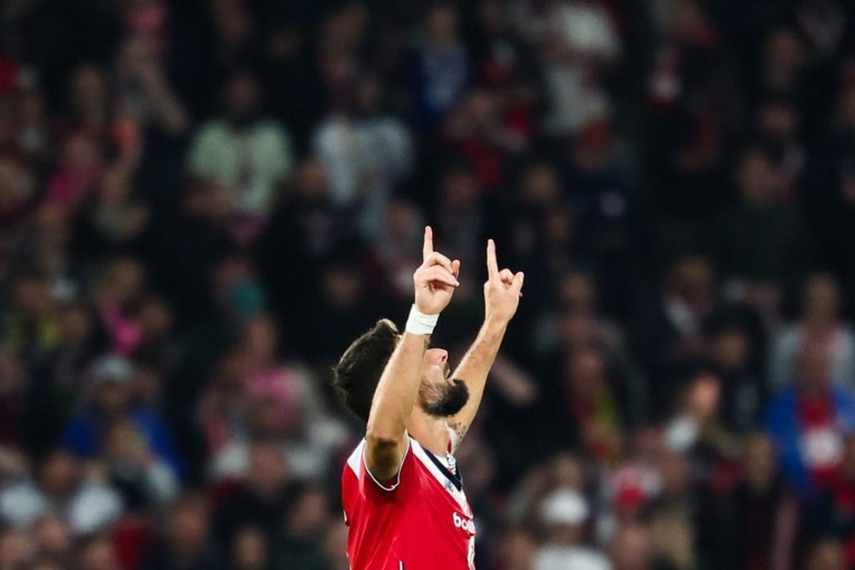Lille's French forward #09 Olivier Giroud celebrates after scoring his team first goal during the French L1 football match between Lille LOSC and Stade Brestois 29 (Brest) at the Stade Pierre-Mauroy in Villeneuve-d'Ascq, northern France, on October 17, 2026. Sameer AL-DOUMY / AFP