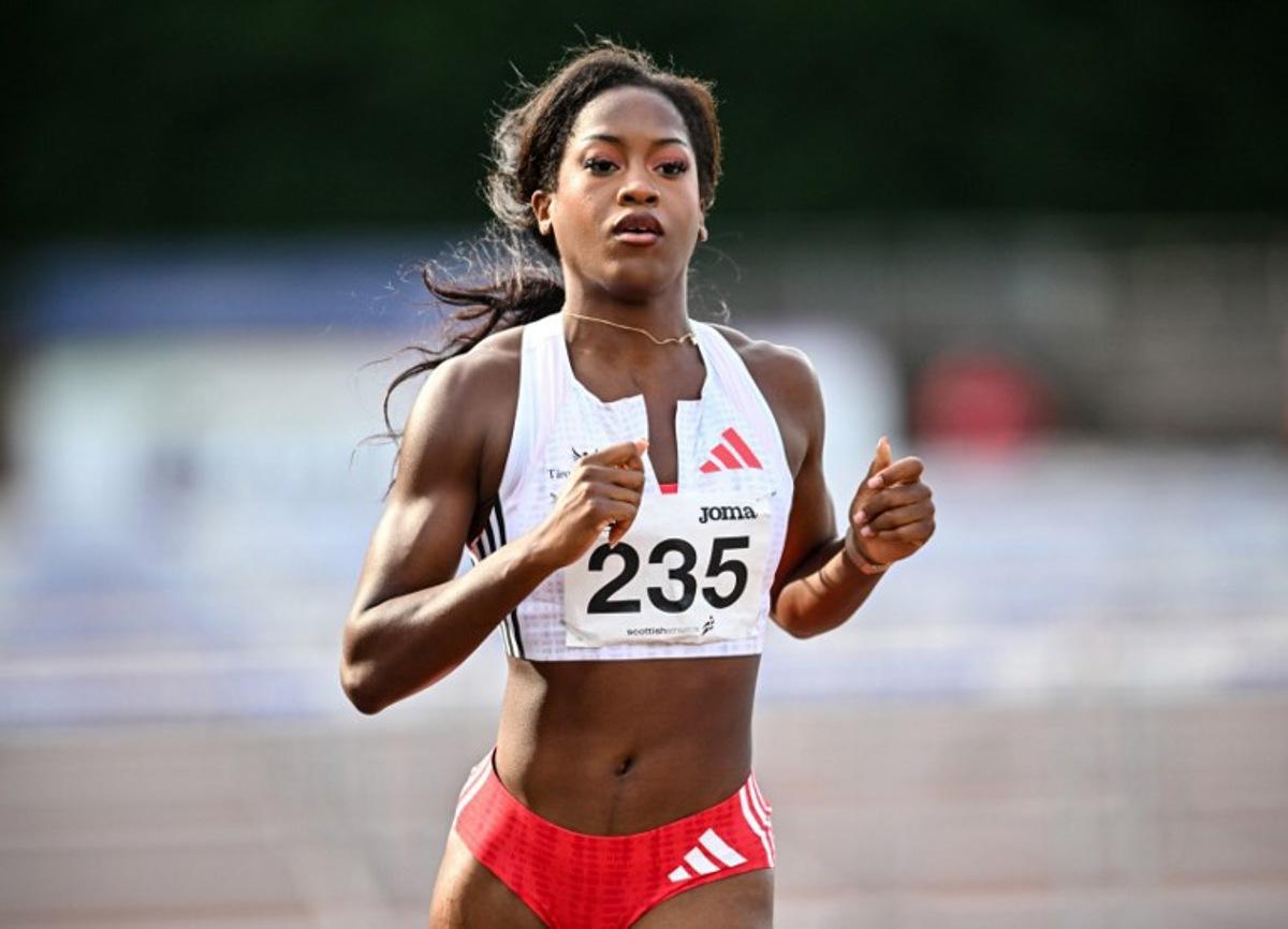 France's Cyrena Samba-Mayela reacts after competing to take fourth place in Women's 100m hurdles final at the Scottish Athletics Championships at Grangemouth Stadium, in Grangemouth, Scotland on August 24, 2025. Andy Buchanan / AFP