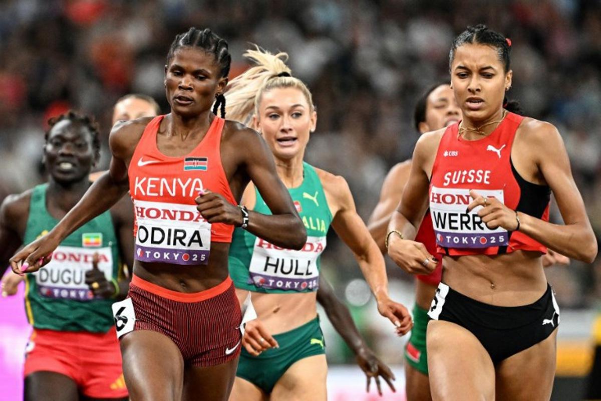 (from 2ndL) Kenya's athlete Lilian Odira, Australia's athlete Jessica Hull and Switzerland's athlete Audrey Werro run to the finish line in the women's 800m semi-final during the World Athletics Championships in Tokyo on September 19, 2025. Jewel SAMAD / AFP
