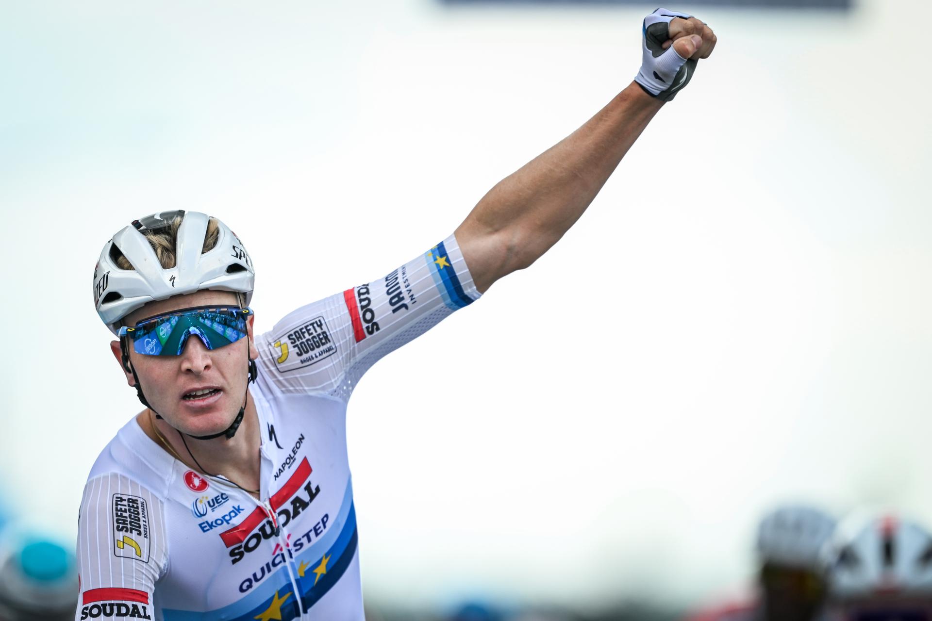 Belgian Tim Merlier of Soudal Quick-Step celebrates as he crosses the finish line to win the fourth stage of the 'Renewi Tour' multi-stage cycling race, from Riemst to Bilzen-Hoeselt (196 km) on Saturday 23 August 2025. The five-day race takes place in Belgium and the Netherlands. BELGA PHOTO DAVID PINTENS