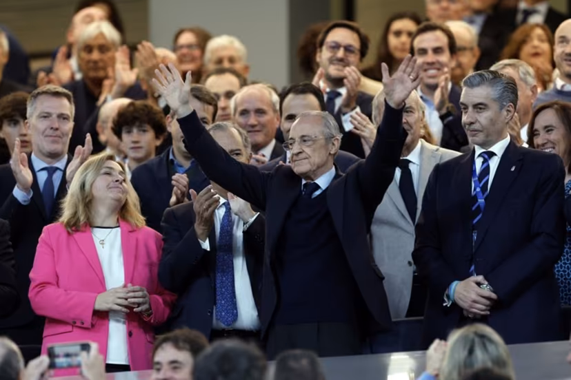 Real Madrid president Florentino Perez (C) waves from the stands before the Spanish league football match between Real Madrid CF and Real Oviedo at Santiago Bernabeu Stadium in Madrid on May 14, 2026. Real Madrid officially started their electoral process today, after president Florentino Perez announced his decision to call elections, in which he will stand. There is a 10-day window, until May 23, for the submission of candidacies, Madrid said in a statement. Among the requirements to be a candidate are having been a club member for 20 years and providing a guarantee of 187 million euros ($219m), equivalent to 15 percent of the club's annual budget, which must be backed by personal assets. Oscar DEL POZO / AFP