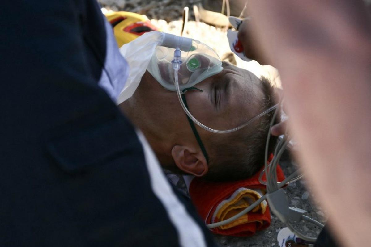 Uno-X Mobility team's Norwegian rider Tobias Johannessen receives medical assistance upon arrival at the summit of Mont Ventoux during the 16th stage of the 112th edition of the Tour de France cycling race, 171.5 km between Montpellier and Mont Ventoux, southern France, on July 22, 2025. Marco BERTORELLO / AFP