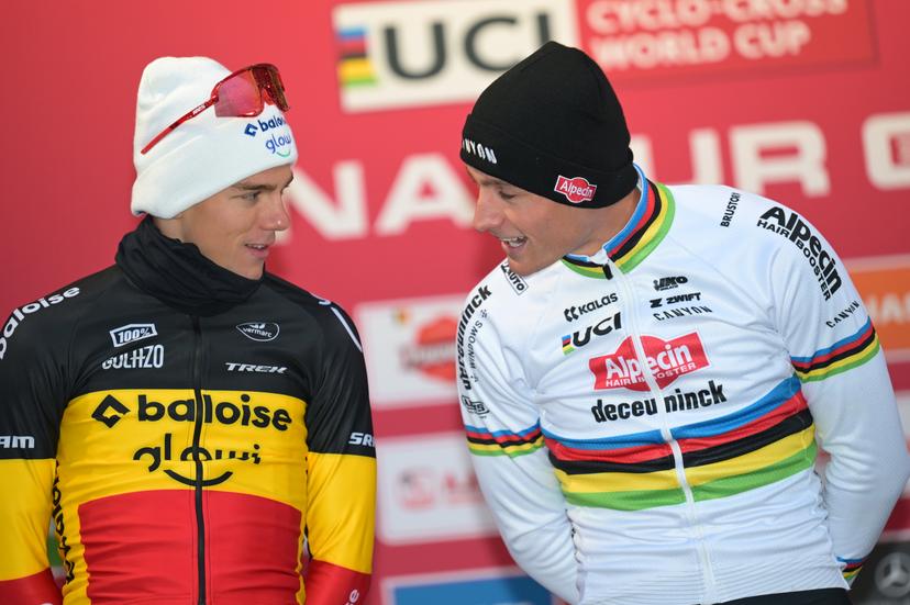Belgian Thibau Nys and Dutch Mathieu Van Der Poel pictured on the podium after the men's elite race of the Cyclocross World Cup, in Namur, Sunday 14 December 2025, stage 4 (out of 12) in the World Cup of the 2026-2027 season. BELGA PHOTO DAVID PINTENS