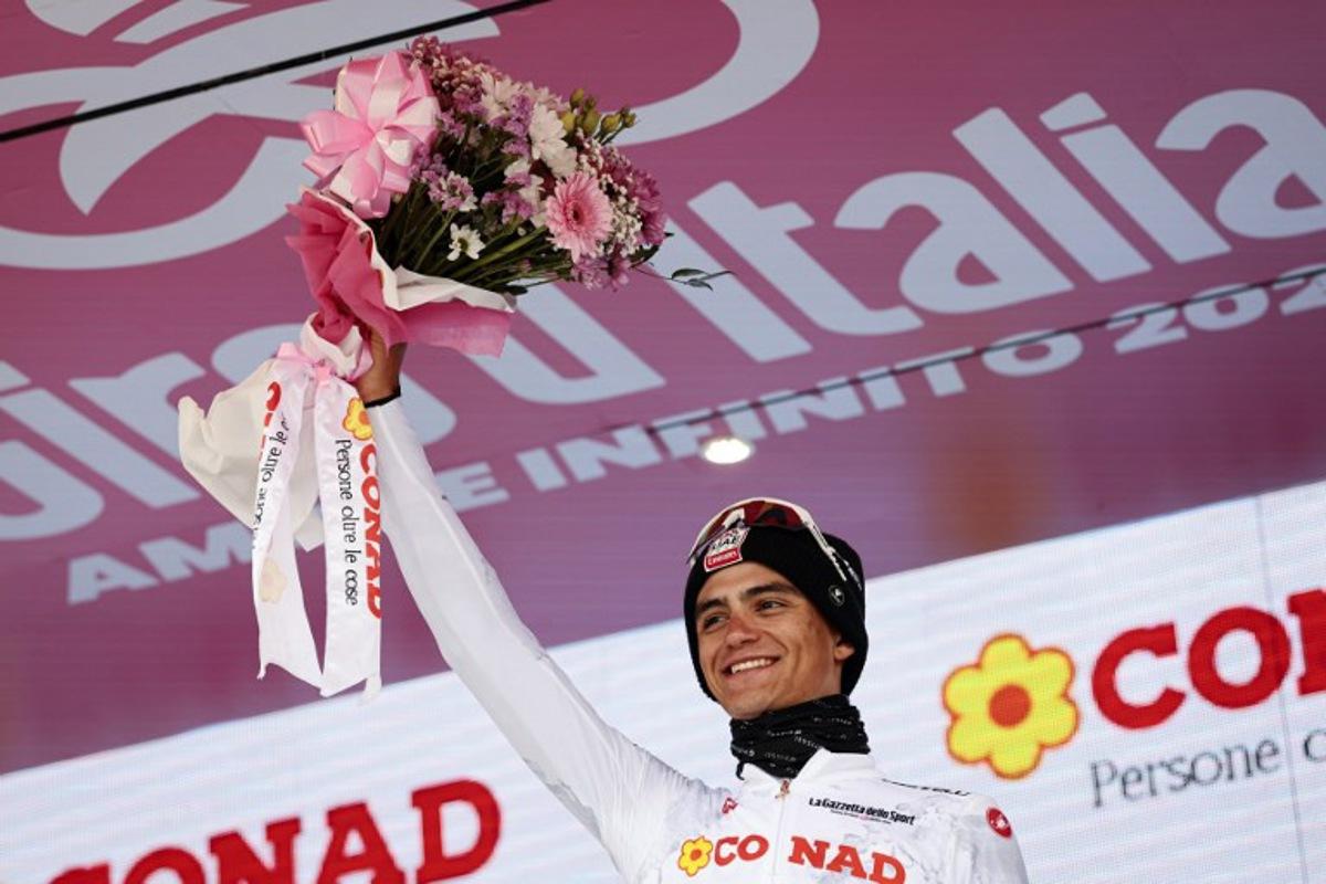 UAE Team Emirates XRG's Mexican rider Isaac Del Toro wearing the best young rider's white jersey (Maglia Bianca) celebrates on the podium after the 20th stage of the 108th Giro d'Italia cycling race 205kms from Verres to Sestriere on May 31, 2025. Luca Bettini / AFP