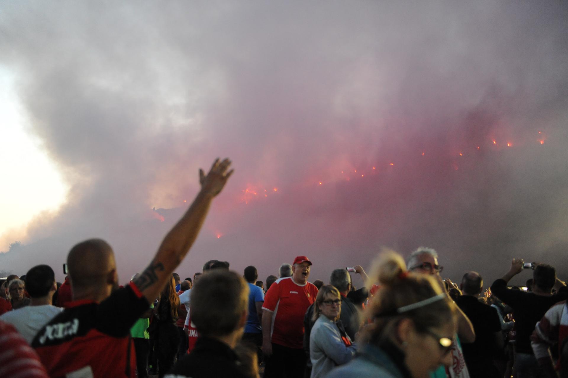 Atmosphere around the stadium the Ultras shooting fireworks at the start of the second half the Jupiler Pro League match between Standard de Liege and Sint-Truiden, in Liege, Saturday 06 August 2016, on second day of the Belgian soccer championship. This game is played without spectators as sanction after last season incidents during a game with Charleroi. BELGA PHOTO SOPHIE KIP