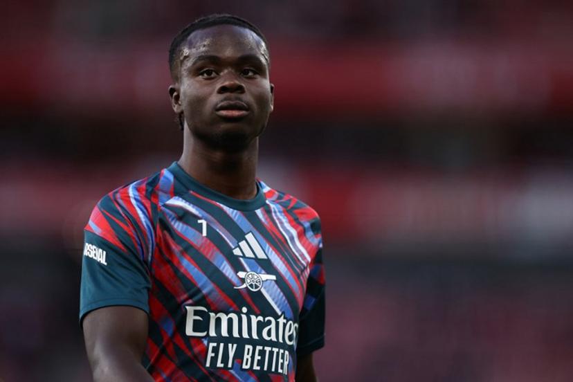 Arsenal's English midfielder #07 Bukayo Saka warms up ahead of the English Premier League football match between Arsenal and Coventry City at the Emirates Stadium in London on August 21, 2026. Henry NICHOLLS / AFP