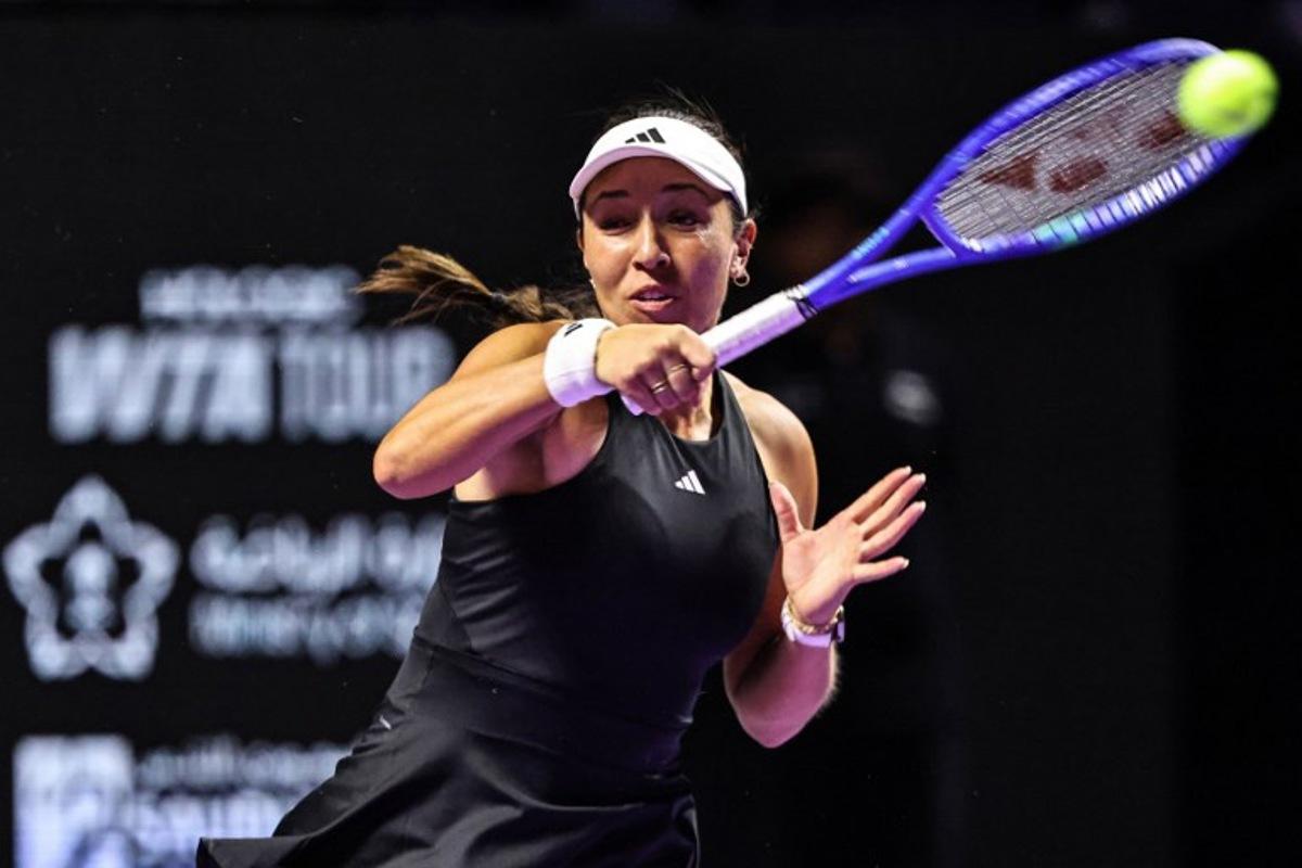 USA's Jessica Pegula hits a return against USA's Coco Gauff during their tennis match at the WTA Finals in Riyadh on November 2, 2025. Fayez NURELDINE / AFP