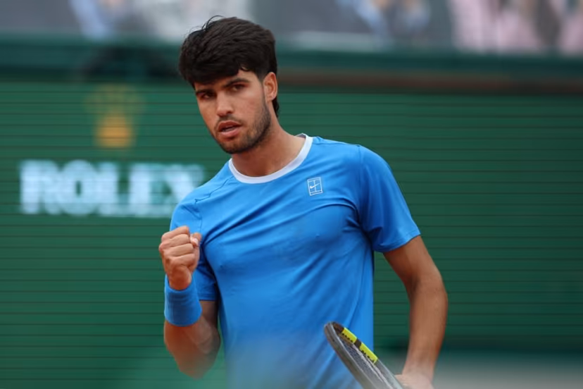Spain's Carlos Alcaraz reacts as he plays against Italy's Jannik Sinner during the Monte Carlo ATP Masters Series Tournament final tennis match on Court Rainier III at the Monte-Carlo Country Club in Roquebrune-Cap-Martin, south-eastern France on April 12, 2026. Valery HACHE / AFP