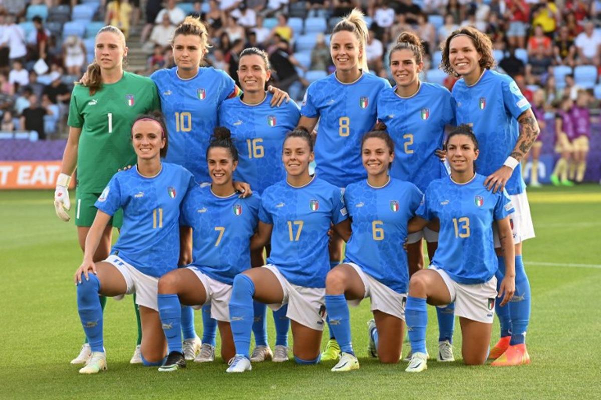Back row LtoR, Italy's goalkeeper Laura Giuliani, Italy's striker Cristiana Girelli, Italy's defender Lucia di Guglielmo, Italy's midfielder Martina Rosucci, Italy's defender Valentina Bergamaschi and Italy's defender Elena Linari and front row LtoR, Italy's striker Barbara Bonansea, Italy's midfielder Flaminia Simonetti, Italy's defender Lisa Boattin, Italy's midfielder Manuela Giugliano and Italy's defender Elisa Bartoli pose for a photograph ahead of the UEFA Women's Euro 2022 Group D football match between Italy and Belgium at Manchester City Academy Stadium in Manchester, north-west England on July 18, 2022. Daniel MIHAILESCU / AFP