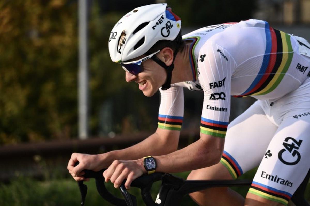 UAE Team Emirates's Slovenian rider Tadej Pogacar cycles in a lone breakawy in the Passo Di Ganda descent during the 119th edition of the Giro di Lombardia (Tour of Lombardy), a 238km cycling race from Como to Bergamo on October 11, 2025. Marco BERTORELLO / AFP