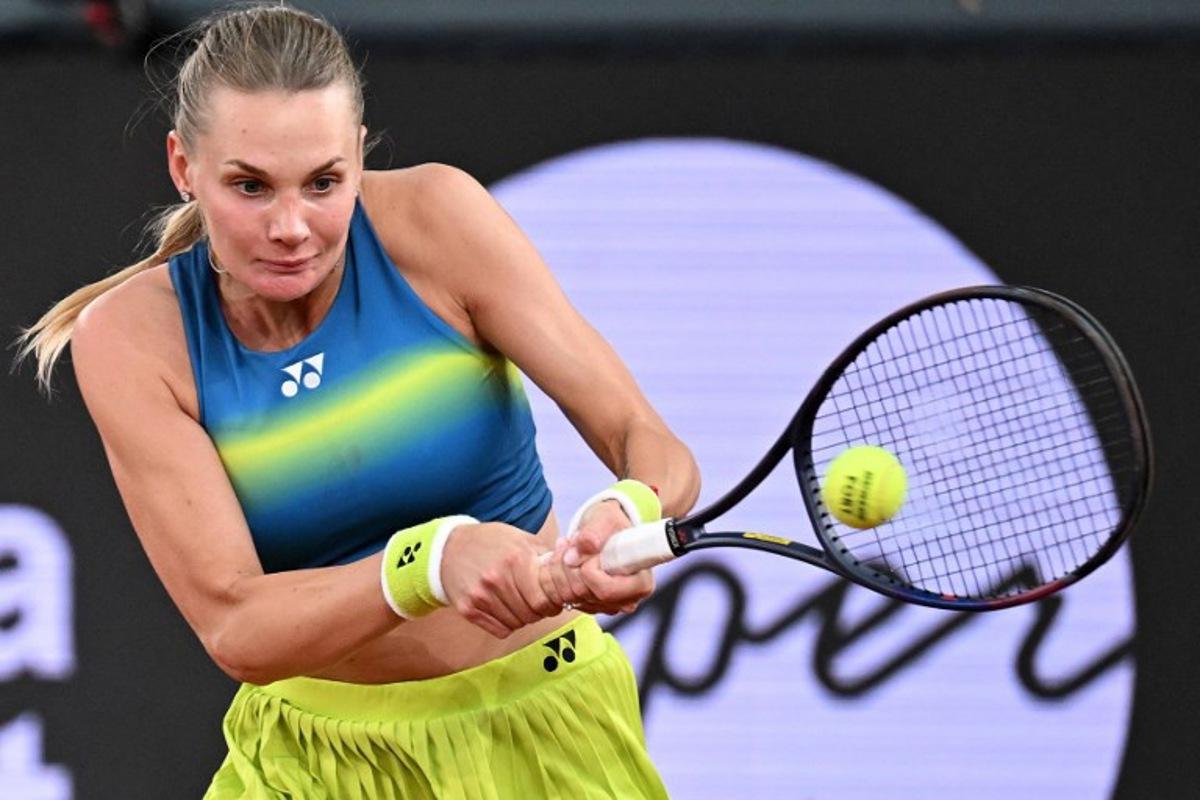 Ukraine's Dayana Yastremska hits a return to USA's Ann Li during their women's singles match of the WTA Upper Austria Ladies Linz tennis tournament in Linz, Austria on April 7, 2026. BARBARA GINDL / APA / AFP
