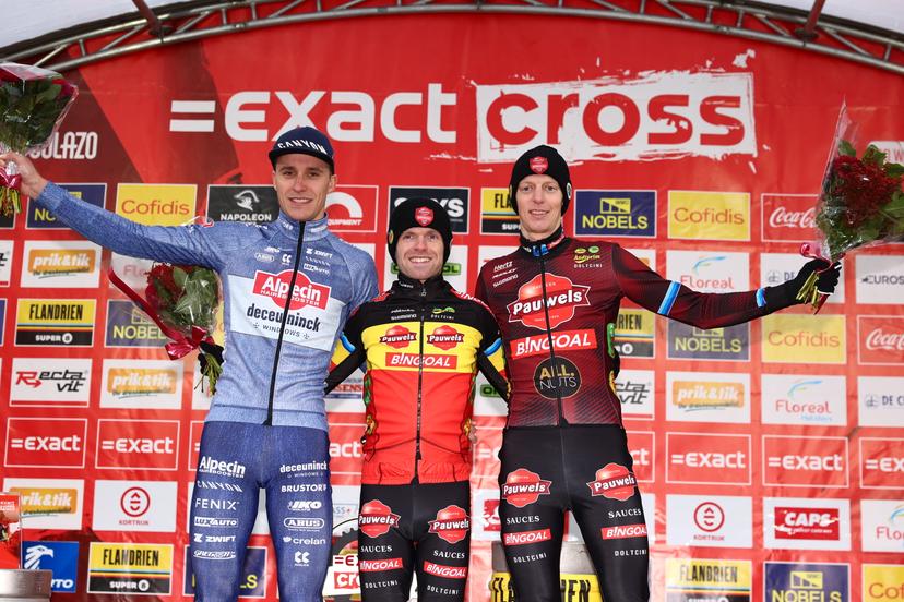 Belgian Niels Vandeputte, Belgian Eli Iserbyt and Belgian Michael Vanthourenhout pictured on the podium after the men elite race at the 'CAPS Urban Cross Kortrijk' cyclocross cycling event on in Kortrijk, the fourth stage (out of 7) in the Exact Cross 2024-2025 competition. BELGA PHOTO DAVID PINTENS