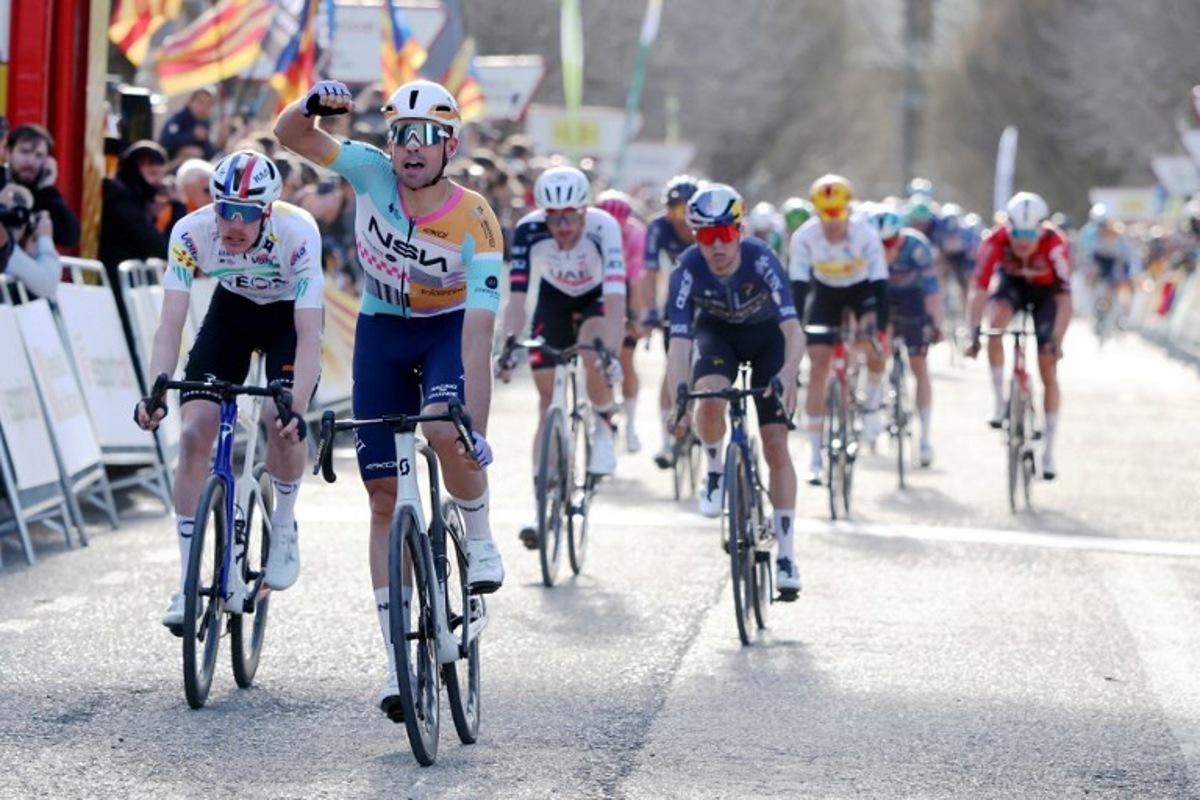 Team NSN Cycling Team's Welsh rider Ethan Vernon (2L) celebrates winning the 4th stage of the 2026 Volta a Catalunya cycling tour of Catalonia, a 151 km race between Mataro and Camprodon, on March 26, 2026. Josep LAGO / AFP