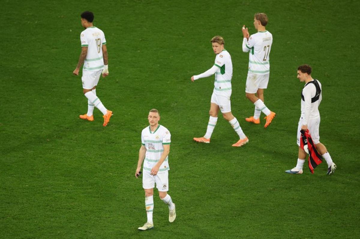 Eagles' players leave the pitch after losing the Europa League football match between OGC Nice and Go Ahead Eagles at Allianz Riviera stadium in Nice on January 22, 2026. Valery HACHE / AFP
