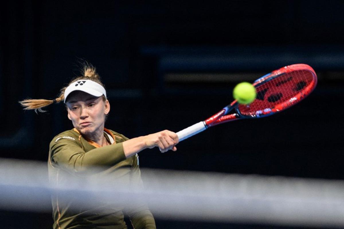 Kazakhstan's Elena Rybakina hits a return to Canada's Victoria Mboko during their women's singles match at the Pan Pacific Open tennis tournament in Tokyo on October 24, 2025. Philip FONG / AFP