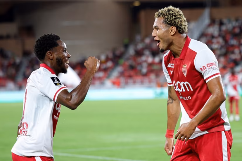 Monaco's German forward #29 Paris Brunner (R) celebrates with teammate Monaco's Belgian midfielder #17 Stanis Idumbo after scoring his team's first goal during the French L1 football match between AS Monaco and Olympique de Marseille (OM) at the Stade Louis II in the Principality of Monaco on August 30, 2026. Valery HACHE / AFP