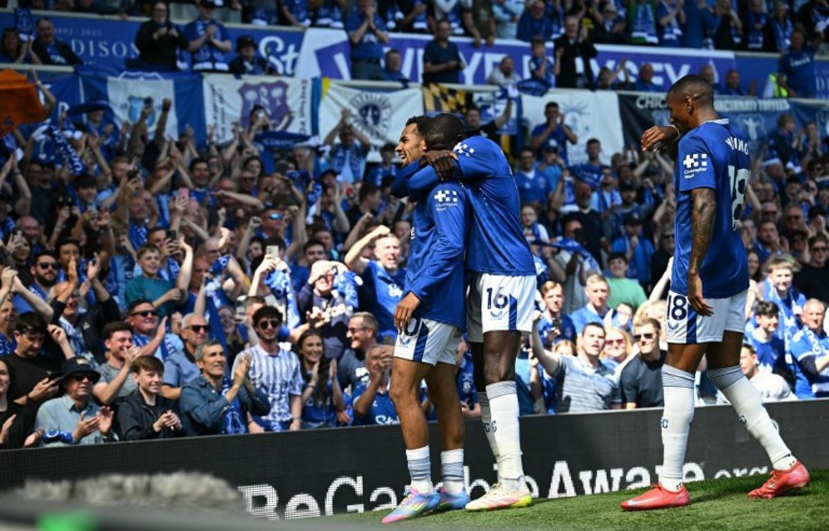 Everton's Senegalese striker #10 Iliman Ndiaye (L) celebrates scoring the team's second goal during the English Premier League football match between Everton and Southampton at Goodison Park in Liverpool, north west England on May 18, 2025, Everton's final premier league fixture played at the stadium, their home since 1892. Paul ELLIS / AFP