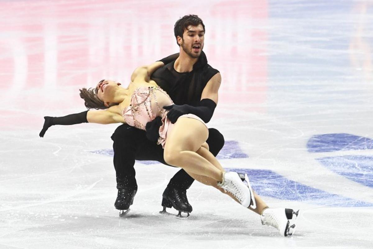 France's Laurence Fournier Beaudry and Guillaume Cizeron perform during the Ice Dance rhythm dance skating program of the 2026 ISU Figure Skating World Championships in Prague on March 27, 2026. Michal Cizek / AFP
