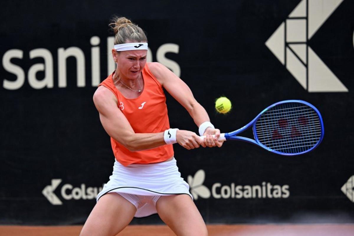 Czech Republic's Marie Bouzkova returns the ball to Hungary's Panna Udvardy during the WTA Bogota women's singles final match at the Country Club in Bogota on April 5, 2026. RAUL ARBOLEDA / AFP