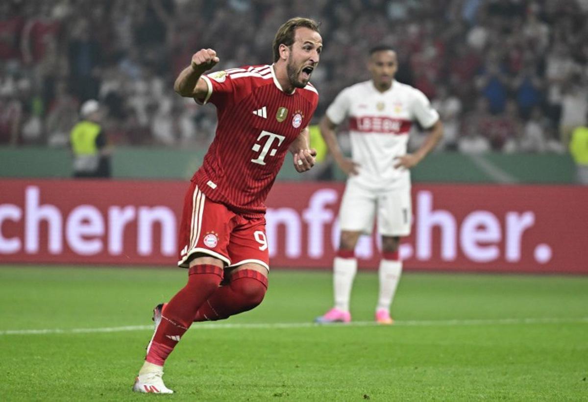 Bayern Munich's English forward #09 Harry Kane celebrates after scoring a penalty during the German Cup (DFB Pokal) final football match FC Bayern Munich v VfB Stuttgart at the Olympic Stadium in Berlin, on May 23, 2026. Tobias SCHWARZ / AFP