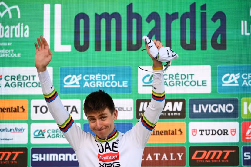 UAE Team Emirates's Slovenian rider Tadej Pogacar celebrates his victory on the podium after the 119th edition of the Giro di Lombardia (Tour of Lombardy), a 238km cycling race from Como to Bergamo on October 11, 2025. Marco BERTORELLO / AFP
